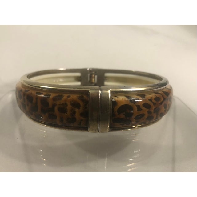 This retro 1980s Lucite Tortoise Clamper Bangle Bracelet will be a fabulous addition to your vintage jewelry collection....