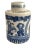 A cylindrical blue and white porcelain tea caddy, finely decorated with the traditional “boys at play” motif symbolizing...