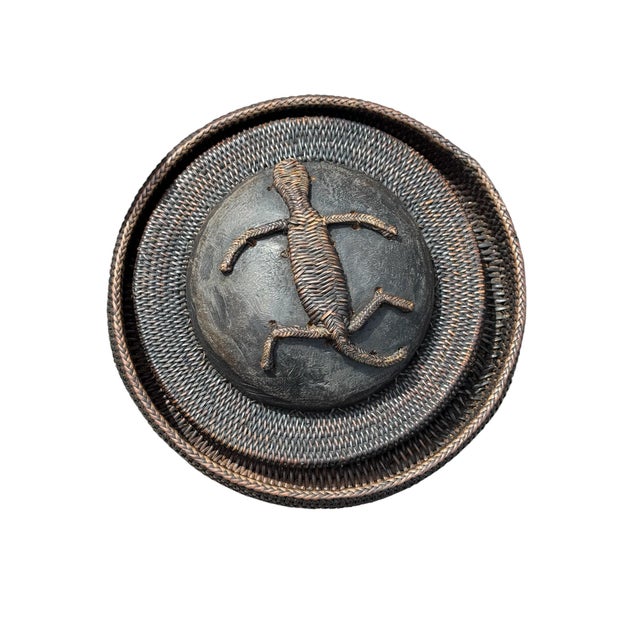 A beautiful lidded basket dish from the Ifugao Tribe in the Philippines. A lizard is woven across the lid.