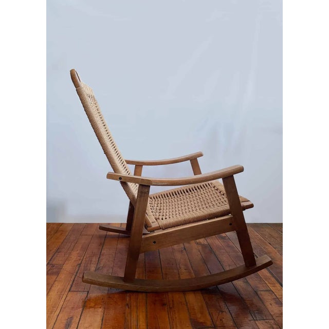 Mid century Danish modern style wood and jute rocking chair. Vintage in good condition…
