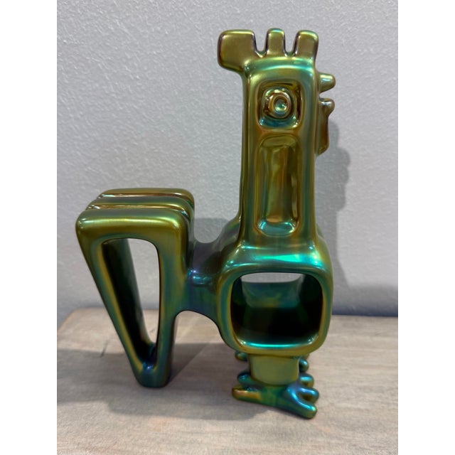 A gorgeous vintage piece from Judith Nador for Zsolnay in an eye-popping iridescent green. Talk a about a pop of color...