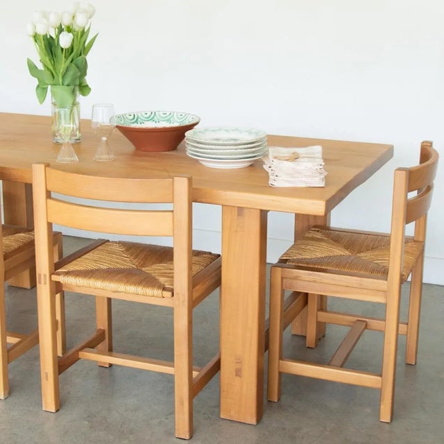 Fantastic solid elm wood table by Maison Regain, France. Joined wood planks on top and four solid wood legs. Original...