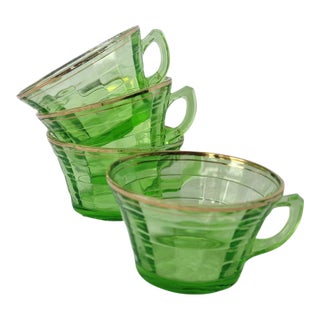 Early 20th Century Uranium Glass 4 Transparent Green Tea Cups With Gold Rim For Sale