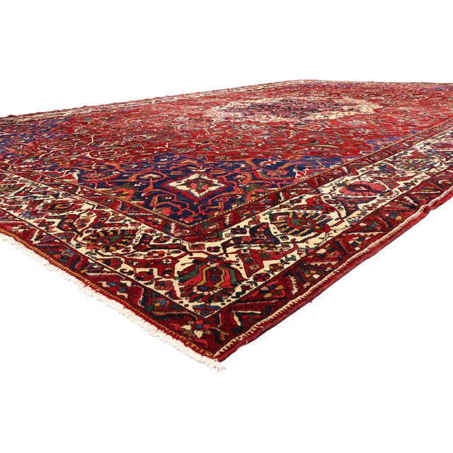 79706 Antique Persian Bakhtiari Rug, 14'06 x 23'00. The Sovereign Bloom: An Antique Persian Bakhtiari Masterpiece of...
