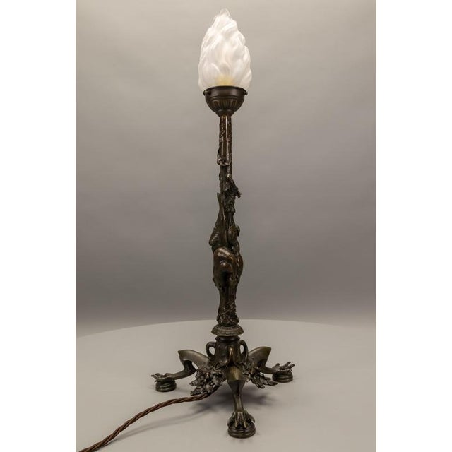French bronze table lamp by Auguste Nicolas Cain, late 19th century. Sculptural animalier lamp originally conceived as a...