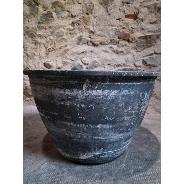 Antique French terracotta wash trough dating from the 19th century and originating from the Auvergne region of France. The...