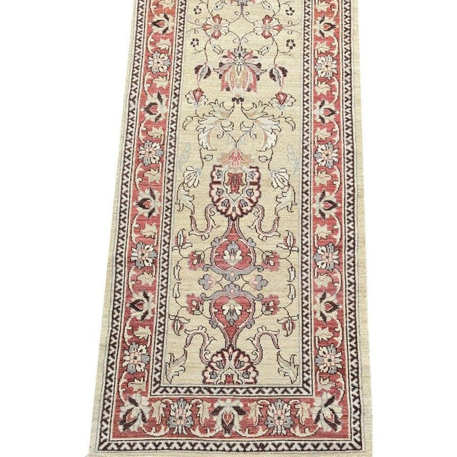 Exact Size: 2'10" x 8'4" Color: Natural Age: New Materials: Wool Construction: Hand Knotted Origin: Pakistan