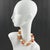 This rare Edouard Rambaud Paris ceramic choker necklace features a romantic-inspired design with large ceramic beads in...