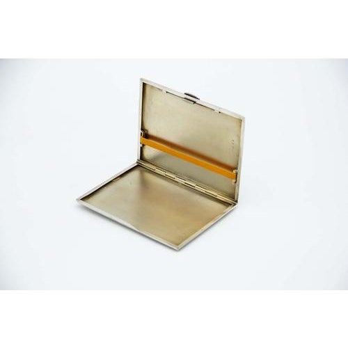 Rectangular Shaped Guilloche Silver Cigarette Case with Spring Lid and Gold Interior, in Very Good conditions. Designed...