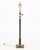 Neoclassical Style Ebonized and Gilt Metal Floor Lamp, with two bulb fittings and fluted column accent above square base....