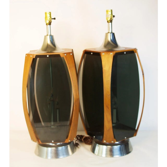 They're big. They're bold. They're bodacious. Mid-Century Modern table lamps by Lawrin. Three internal candle bulbs create...