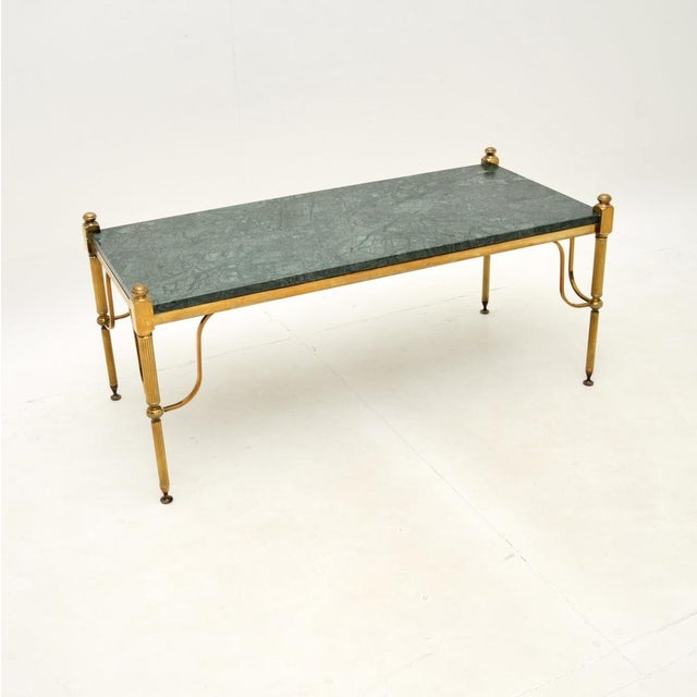A stunning vintage French brass and marble coffee table, dating from the 1960’s. This is of outstanding quality, the solid...
