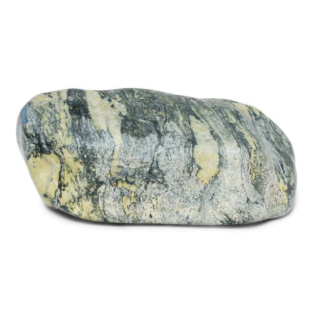 Following the sculpted form, marbled coloring, and natural veining of this one-of-a-kind stone can be deeply meditative....