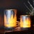 Create a serene winter ambiance with the Navy Pine Tree Glass Candle Holder Set. Featuring cool navy and white tones,...