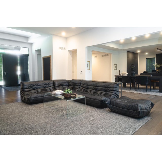 A contemporary 4pc Ligne Roset Togo set by Michel Ducaroy. The Togo is one of the most iconic sofa design lines to come...