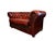 Classic English two-seater Chesterfield from Winchester in rich oxblood leather with deep button-tufting and rolled arms....