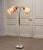 Elegant and sculptural Swedish floor lamp from the 1940s, attributed to Bröderna Malmströms, a maker known for refined...