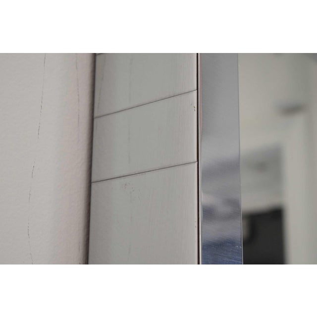 Transform your living space with this exquisite tall mirror by Paul Evans. Known for his innovative designs, this...