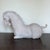 This highly decorative mid-20th-century Tang horse sculpture is a production by Austin Studios, inspired by the powerful,...