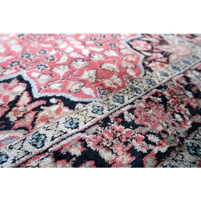 Handmade vintage Persian Tabriz rug made in Kashmir wool. The rug is from the end of 20th century in original good...