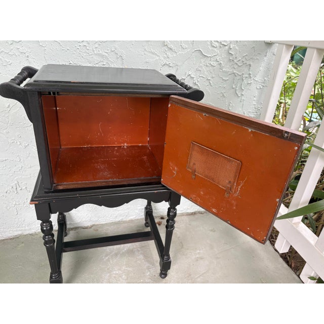 This elegant 1920s James A. Cole “Mastermade” wooden tobacco humidor combines early 20th-century craftsmanship with...
