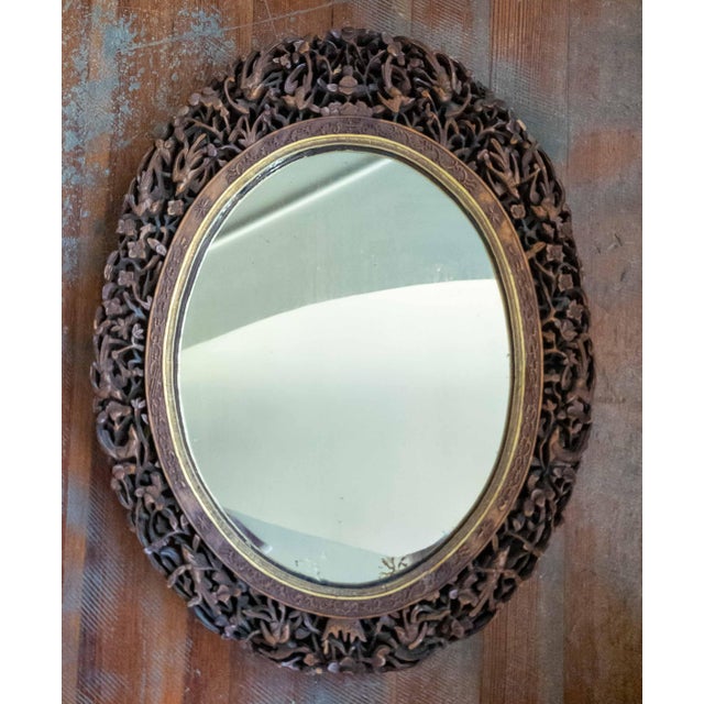 We are selling this really interesting Chines export oval frame. This frame is carved from boxwood with heavily...