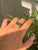 This striking 4.42 carat emerald-cut emerald cocktail ring is crafted in 18K yellow gold. The emerald, measuring about...