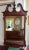 FEDERAL STYLE MIRROR Mahogany frame with carved Georgian top with brass ormolu details * Approx 60 years old * 26" wide x...