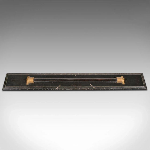 Our Stock # 18.8789 This is an antique nautical rolling ruler. An English, ebony maritime or draughtsman's instrument of...