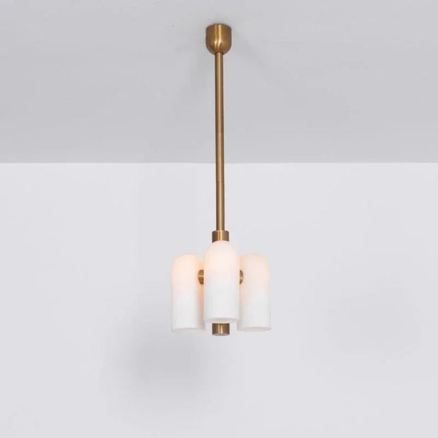 Odyssey 3 brass pendant light by schwung dimensions: w 28.6 x d 28.6 x h 137 cm materials: brass, frosted glass finishes...