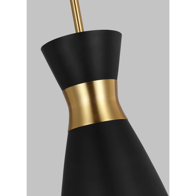 Heath is a chic pendant crafted of metal and a center wrap detail. The cleanness of the contemporary look gives the...