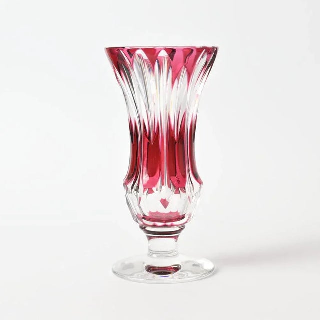 This is a hand cut vase made of cranberry and clear crystal glass. The vase is made by Val Saint Lambert in 1940s and...