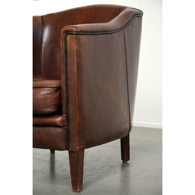 Sheepskin Armchair in a Deep Brown Color Finished with Black Piping For Sale - Image 12 of 13
