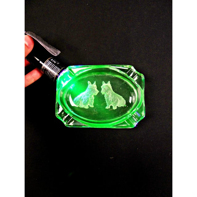 Art Deco-style ashtray in uraline glass engraved with Scottish Terrier dogs What better way to smoke in the dark than with...