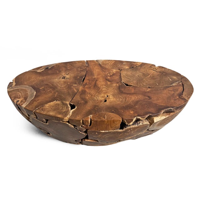Organic modern oval teak root coffee table crafted from naturally formed teak root sections that showcase beautiful...