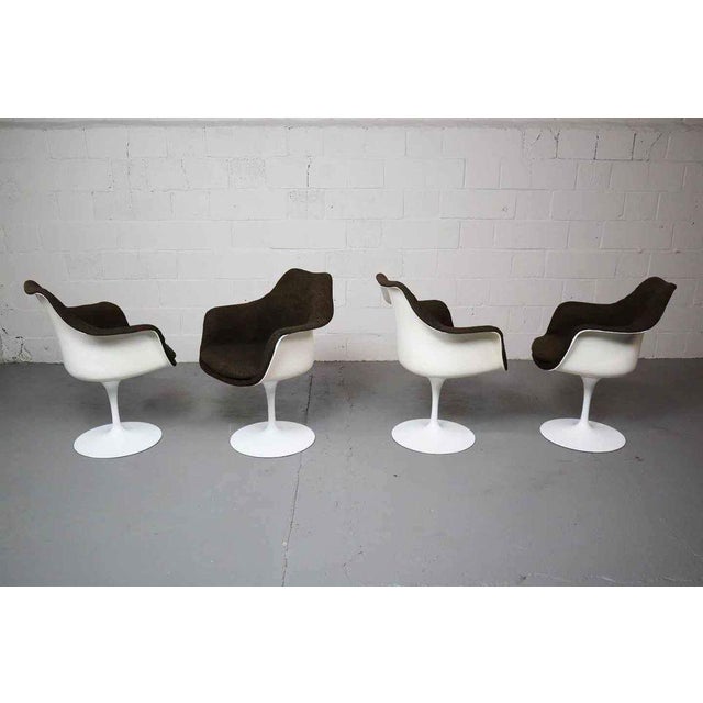 Nice set of four vintage swivel Tulip armchairs model 150 by Eero Saarinen for Knoll International. Designed in 1956....