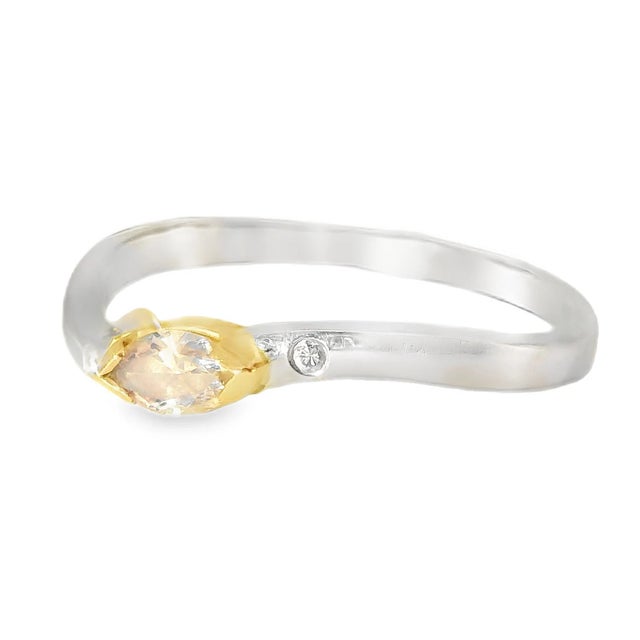 Elegant 18K white and 2-tone gold designer stacking band ring featuring a natural marquise-cut fancy color pink diamond (6...