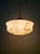 Art Deco pendant light in marbled opaline glass, pale yellow with brown veins, brass mount, 1920s-30s. The pendant light...