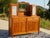 Sideboard with 2 doors and 2 drawers topped with two sentry boxes framing a mirror. Glass-fronted cabinets with pendant...
