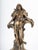 An exceptional French Art Nouveau gilt bronze mantel clock featuring a graceful female figure signed “Ferrand,” resting...