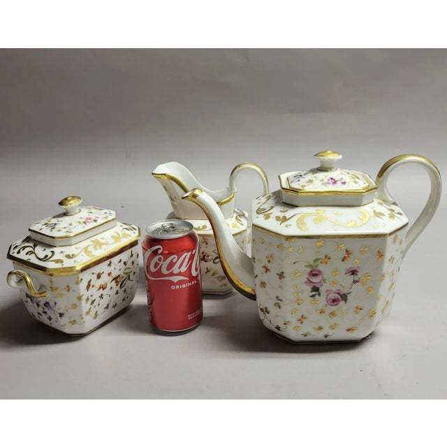 Circa 1840, Old Paris hand painted porcelain French tea set with gold gilt. In excellent condition with very little wear,...