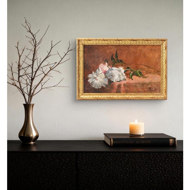 The Antique Flower Paintings category presents a refined oil painting on canvas, a floral still life dating to the 19th...