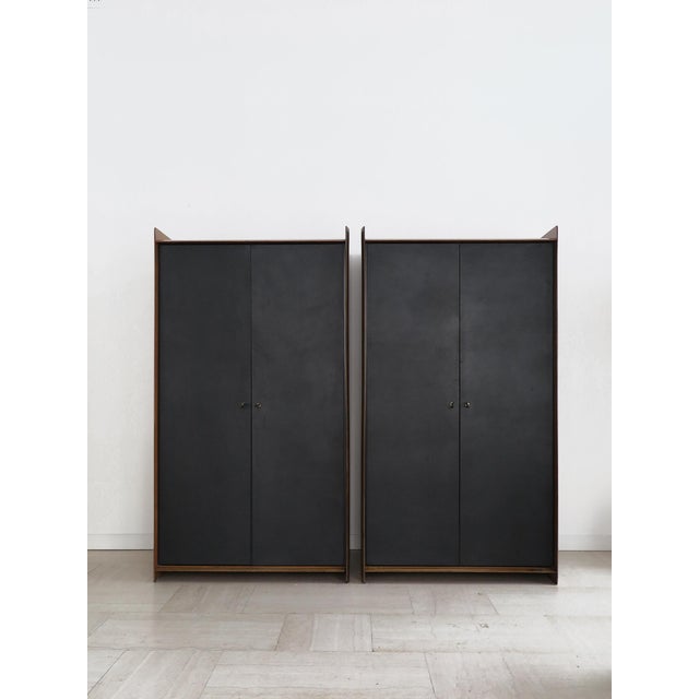 A pair of Italian midcentury modern design cupboards, wardrobes or cabinets from the Artona series, designed by Afra &...