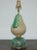 This spectacular Opaline lamp is of two pieces. The base of GREEN and the pear in a netted design of Opaline CREAM with...