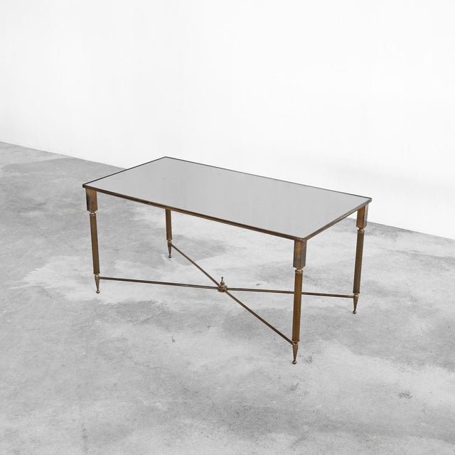Maison Charles Coffee Table in Patinated Brass and Mirror Glass, France, 1960s. Beautiful coffee table in patinated brass...