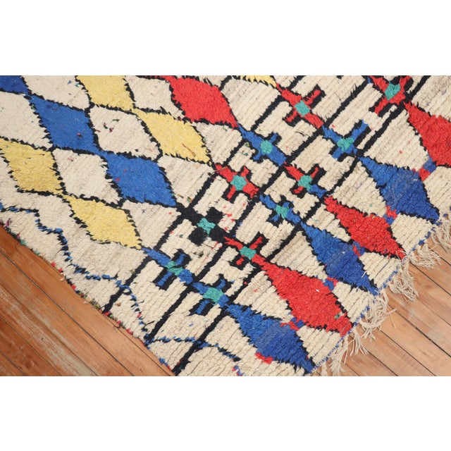 A one-of-a-kind Authentic Moroccan accent size rug from the middle of the 20th century. This piece is pretty wild and fun....
