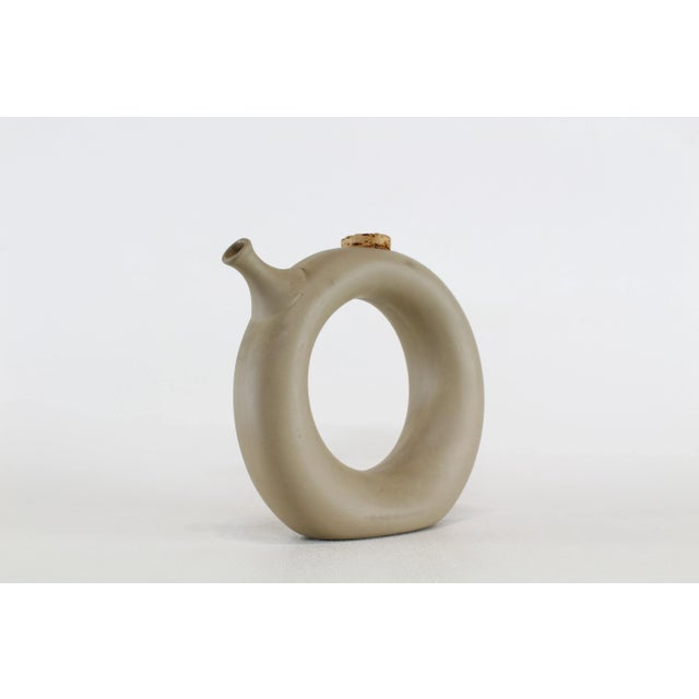 Vintage decorative hand thrown pottery vase Dimensions; 10" Width x 3" Depth x 9.5" Height Minor wear, in mint condition...