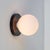 Hey, life doesn’t have to be that complicated. Here, we present the Black Globe Sconce, a cute little highlight that...