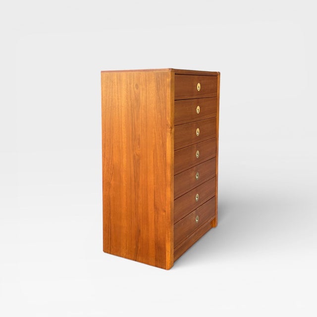 D-Scan Captain Line Teak Seven-Drawer Tallboy Dresser. A vintage mid-century tallboy dresser by D-Scan from the Captain...