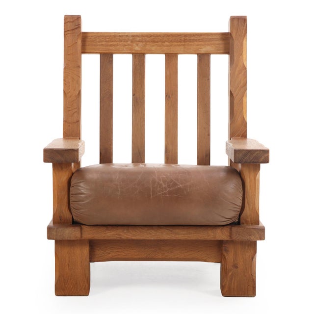 A striking example of mid-century European craftsmanship, this pair of lounge chairs embodies the bold, sculptural...